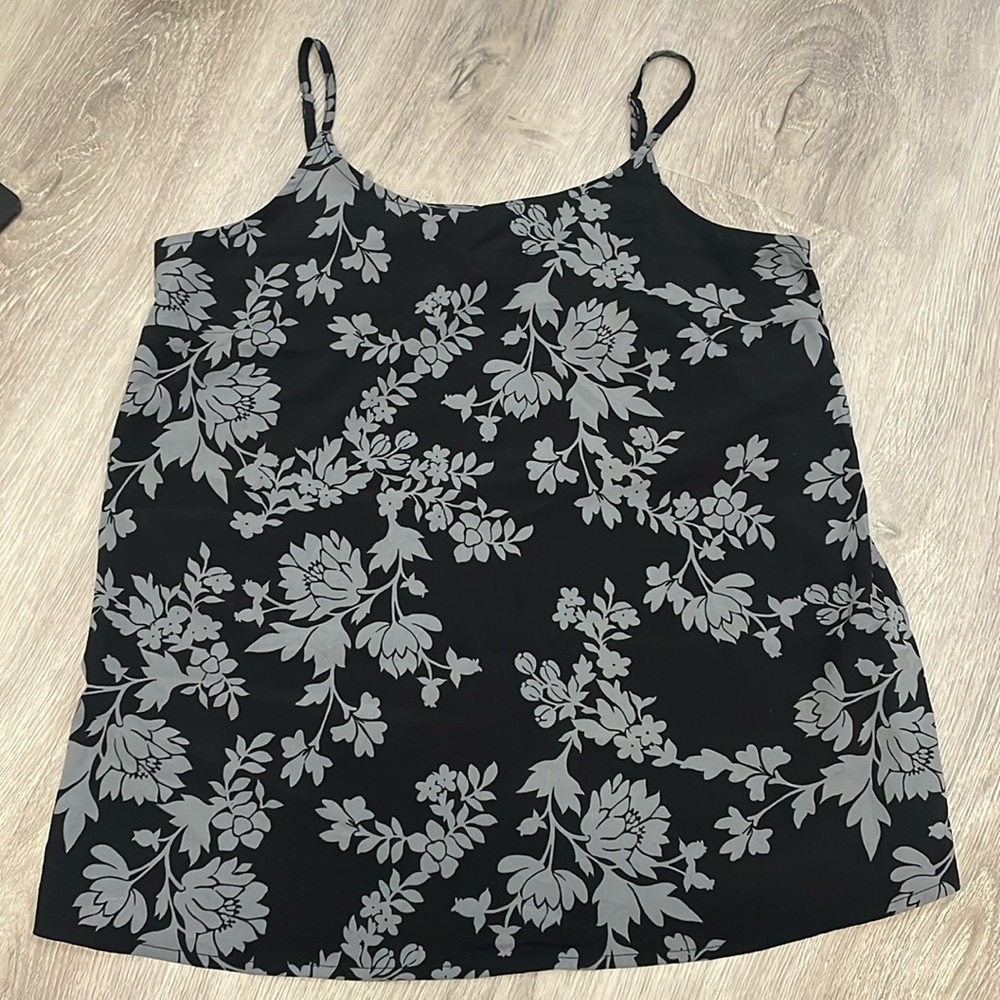 a flower print tank top that pairs perfectly with blue jeans!